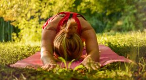 woman doing yoga outdoors